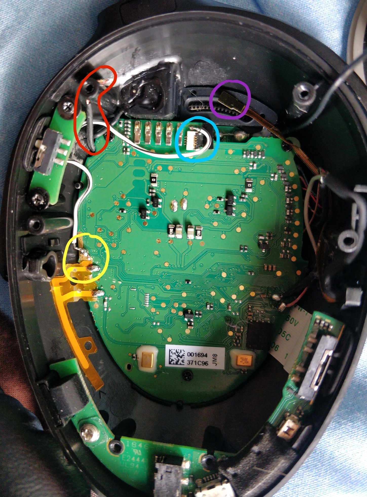 Annotated shot of the right earcup after the mod